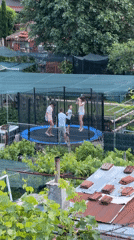 Family enjoys trampoline time in Burgas backyard