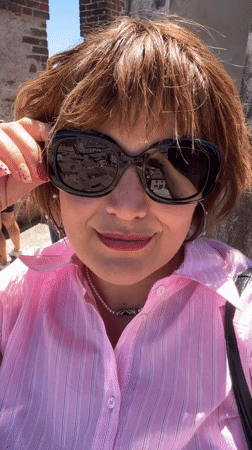 Tourist explores Sirmione's castle and Lake Garda attractions