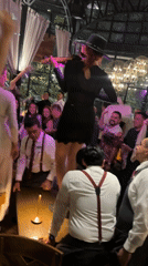 Violinist performs on table at Mexico City celebration
