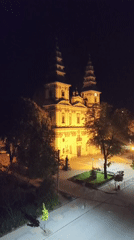 Nighttime church illumination and Ukrainian deity cards observed in Ternopil