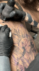Moscow tattoo parlor documents multiple client sessions during afternoon