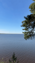 Peaceful lakeside moments captured across Izhevsk waterfront on spring morning
