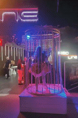 Theatrical cage performance lights up an Odesa night event