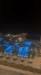 Resort pools glow at night in Northern Cyprus