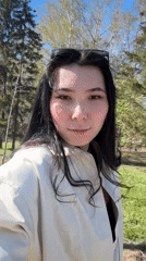 Woman photographed in park during sunny day in Kazan