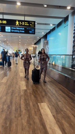Everyday scenes from Bali's airport during a morning layover