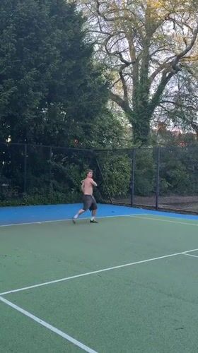 Shirtless tennis player spotted on Cardiff outdoor court