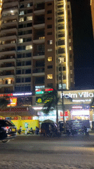 Evening street life and Japanese dining captured in Dar es Salaam