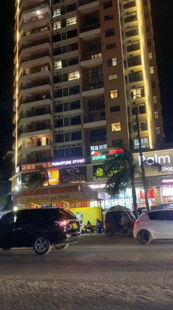 Evening street life and Japanese dining captured in Dar es Salaam
