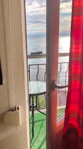 Dawn seascape captured from Odesa balcony shows calm waters