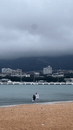 Family enjoys morning beach outing in Gelendzhik, Russia