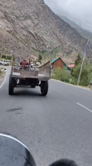 Buddhist stupas, temple shrines, and mountain roads in Gemur