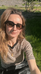 Woman relaxes on grass in Kryvyi Rih park