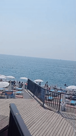Busy summer morning at Konyaaltı Beach, Antalya
