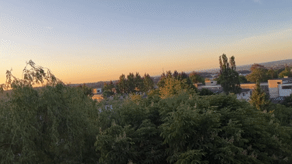 Unknown city documented during sunset hours by single witness