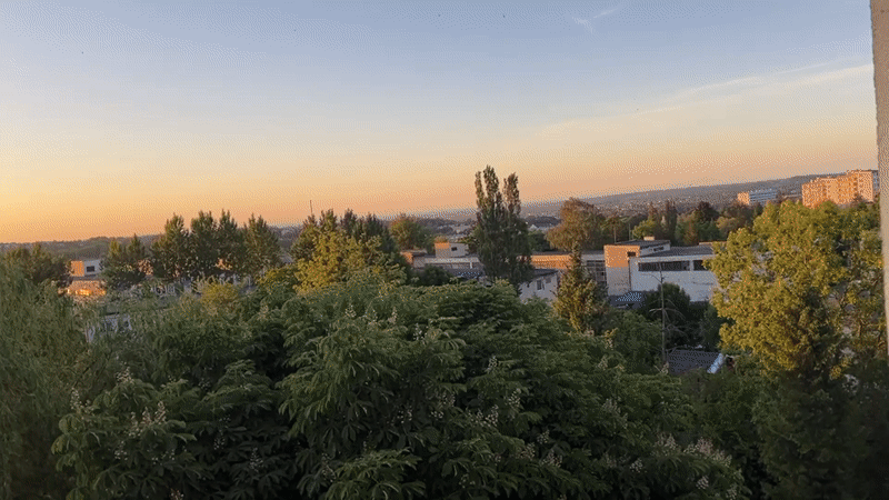 Unknown city documented during sunset hours by single witness