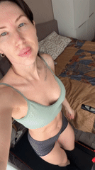 Woman exercises on bedroom treadmill in Perm, Russia