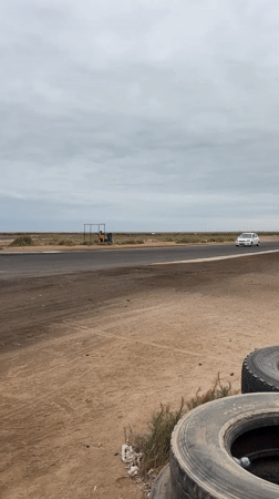 Amateur car races held on desert track in Arica