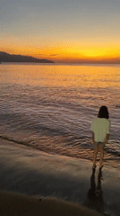 Families enjoy sunset beach time in Đà Nẵng