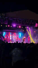 Resort night show: acrobatics, live music, and poolside vibes