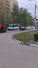 Red-flagged vehicles observed on Elektrostal street during overcast weather