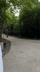 Electric scooter rider spotted on wooded path in Lovech