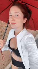 Woman with red umbrella spotted in Choeng Thale