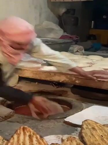Traditional bread-making documented at Kandahar bakery