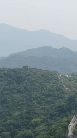 Paragliders soar over Great Wall in Huairou District