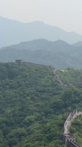 Paragliders soar over Great Wall in Huairou District