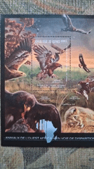 Collector documents Guinea wildlife stamp sheets in Bulgaria