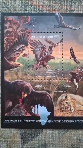 Collector documents Guinea wildlife stamp sheets in Bulgaria