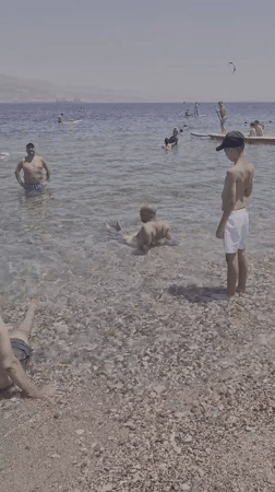Red Sea beachgoers enjoy clear waters in Eilat