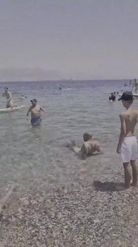 Red Sea beachgoers enjoy clear waters in Eilat