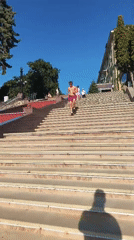 Sunny afternoon at Ternopil's waterfront plaza and staircase