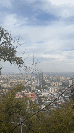 Funicular ride captures Santiago cityscape from hillside vantage point