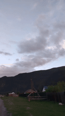 Dusk settles over a quiet Altai village in rural Russia