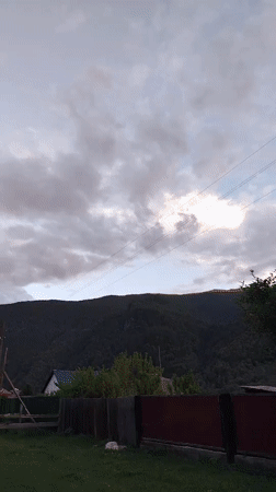 Dusk settles over a quiet Altai village in rural Russia