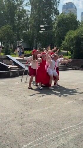 Synchronized dance performance in red and white, Yekaterinburg park