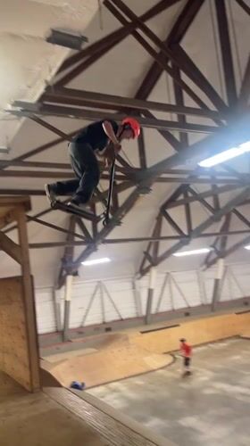 Scooter riders throwing tricks at a Bluewater indoor skatepark
