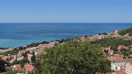 Tourist captures scenic overlook views of coastal Šušanj, Montenegro