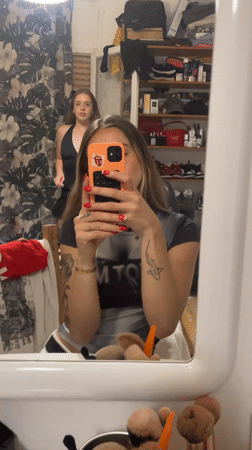 Young women film selfies, mirror videos in Barcelona apartments
