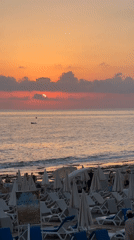 Alanya sunset on the coast, with street cats and sea views