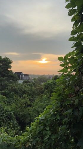 Sunset observed through cloudy skies in Ungasan, Indonesia
