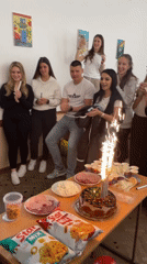 Young adults celebrate birthday with cake and toasts in Zlatograd