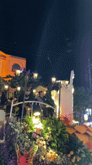 Madiun's streets fill with floats and performers at a nighttime parade