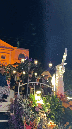 Madiun's streets fill with floats and performers at a nighttime parade