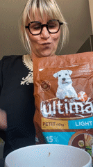 Woman prepares dog food with vegetables in Chambœuf