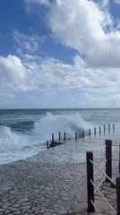 Powerful waves crash against Montenegro coast as observers watch