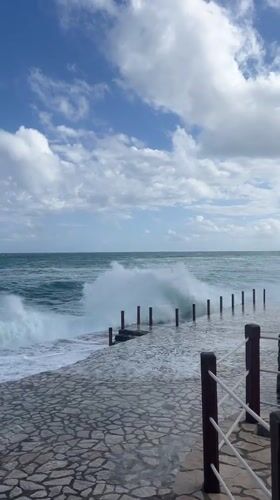 Powerful waves crash against Montenegro coast as observers watch